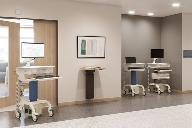 In-between space featuring Fusion Hybrid Cart, Fusion Laptop Cart and M-Series Wall Mount.